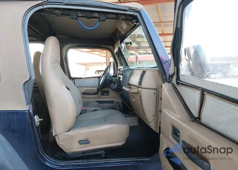 1999 Jeep Wrangler Sport z USA, uszkodzony, nr VIN 1J4FY19S5XP454057